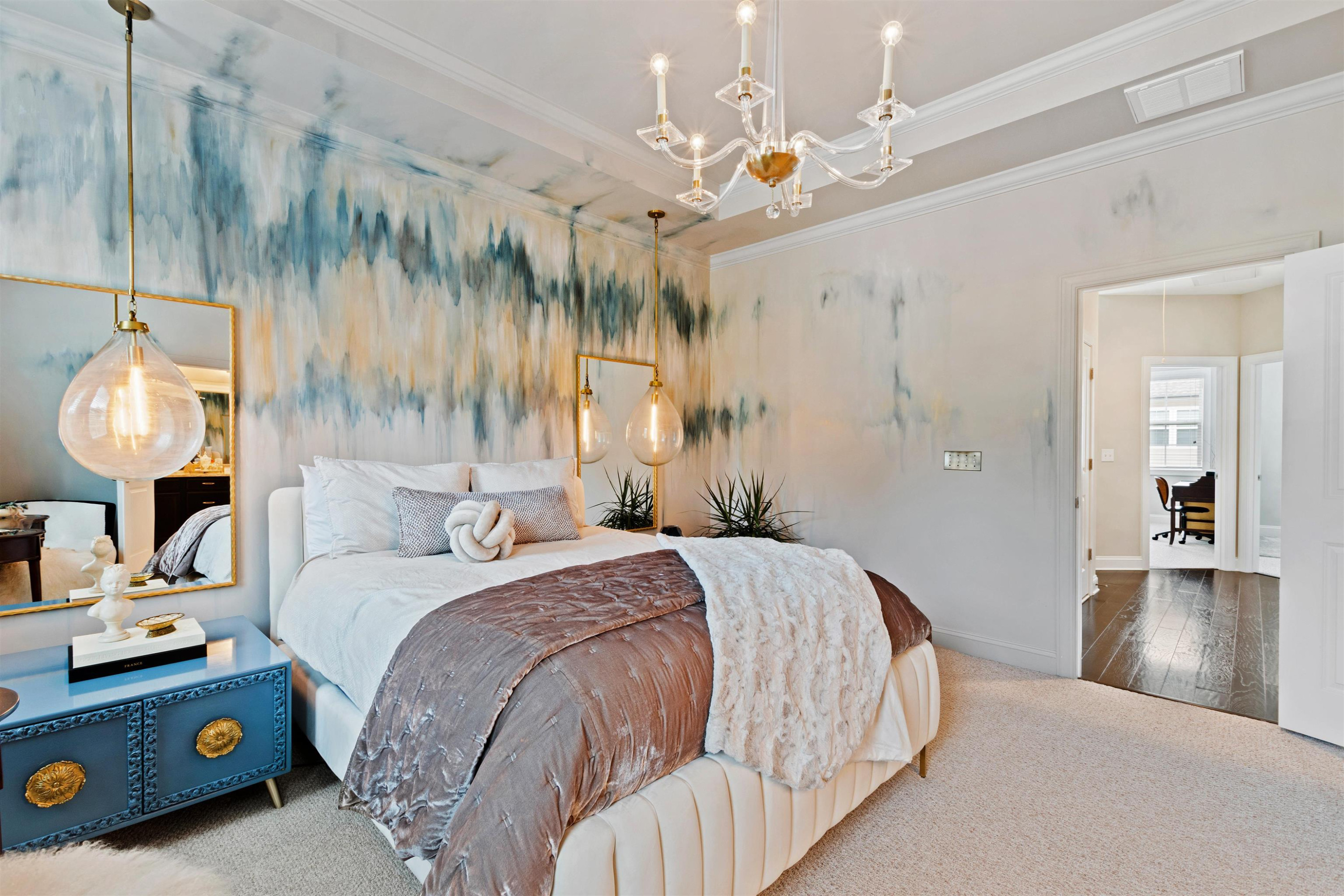 220 Penley Circle Raleigh, NC 27609 - Photo 30 of 56 a bedroom with a bed mirror and fan