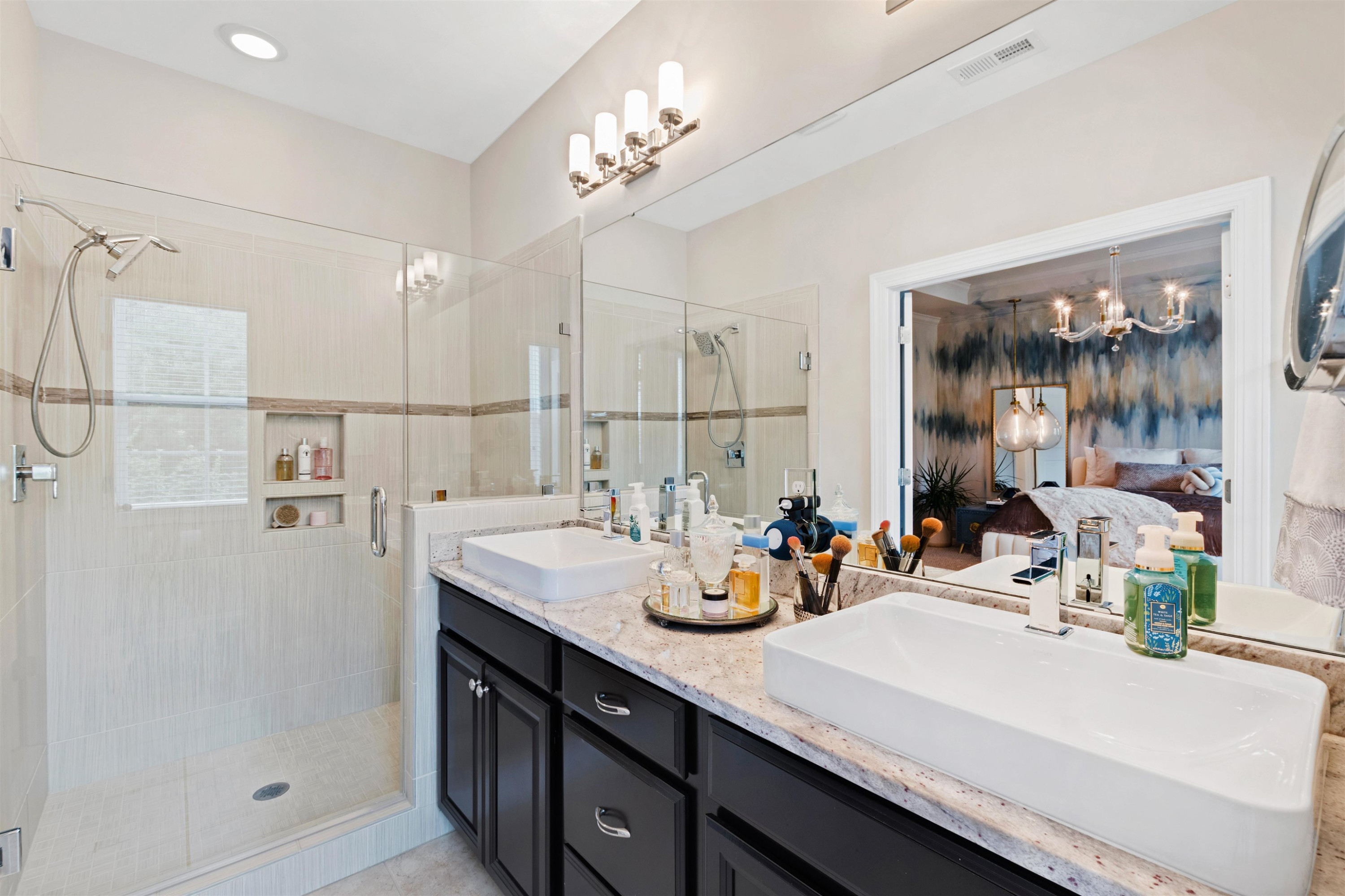 220 Penley Circle Raleigh, NC 27609 - Photo 35 of 56 a bathroom with a sink double vanity and shower
