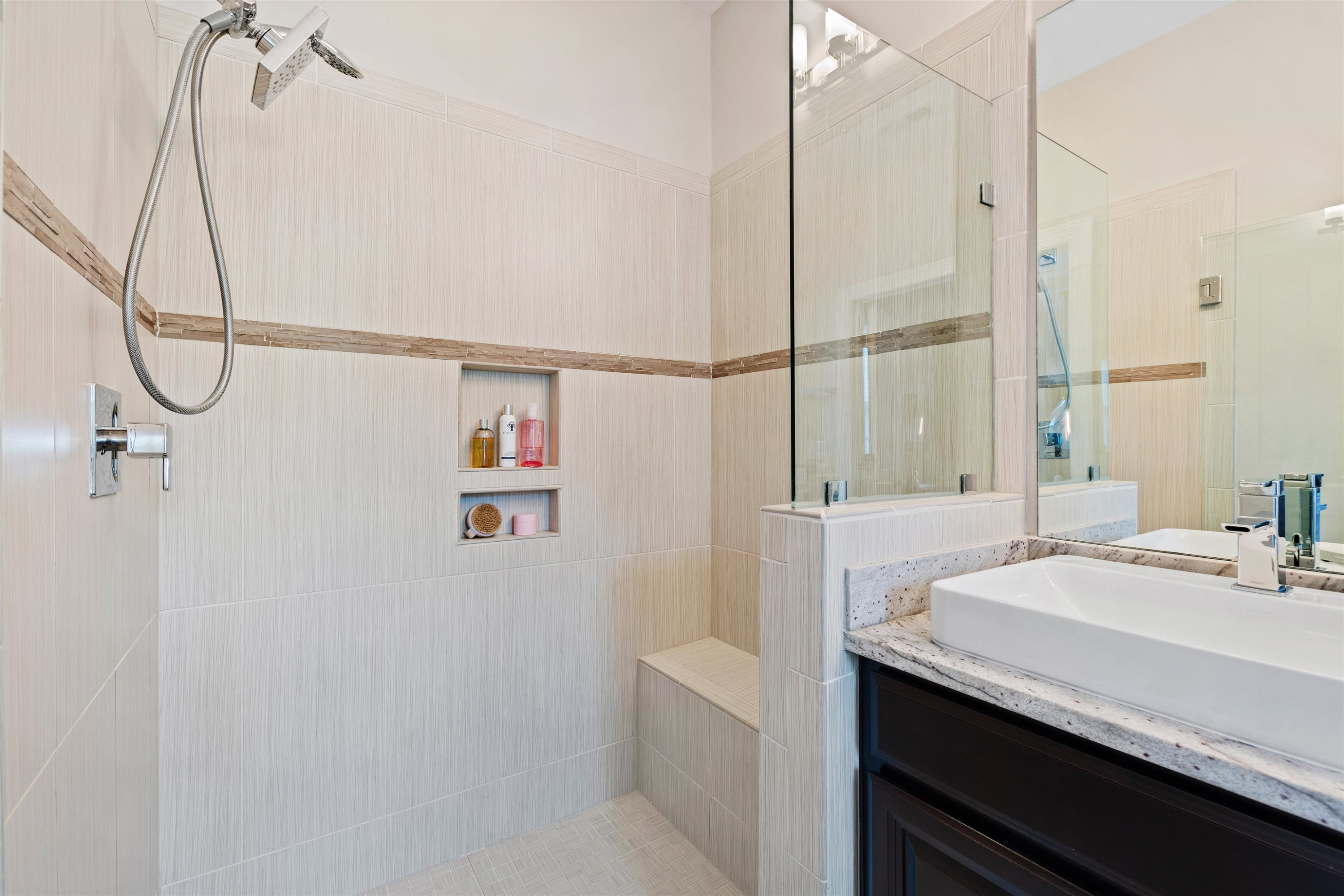 220 Penley Circle Raleigh, NC 27609 - Photo 37 of 56 a bathroom with a sink and a mirror