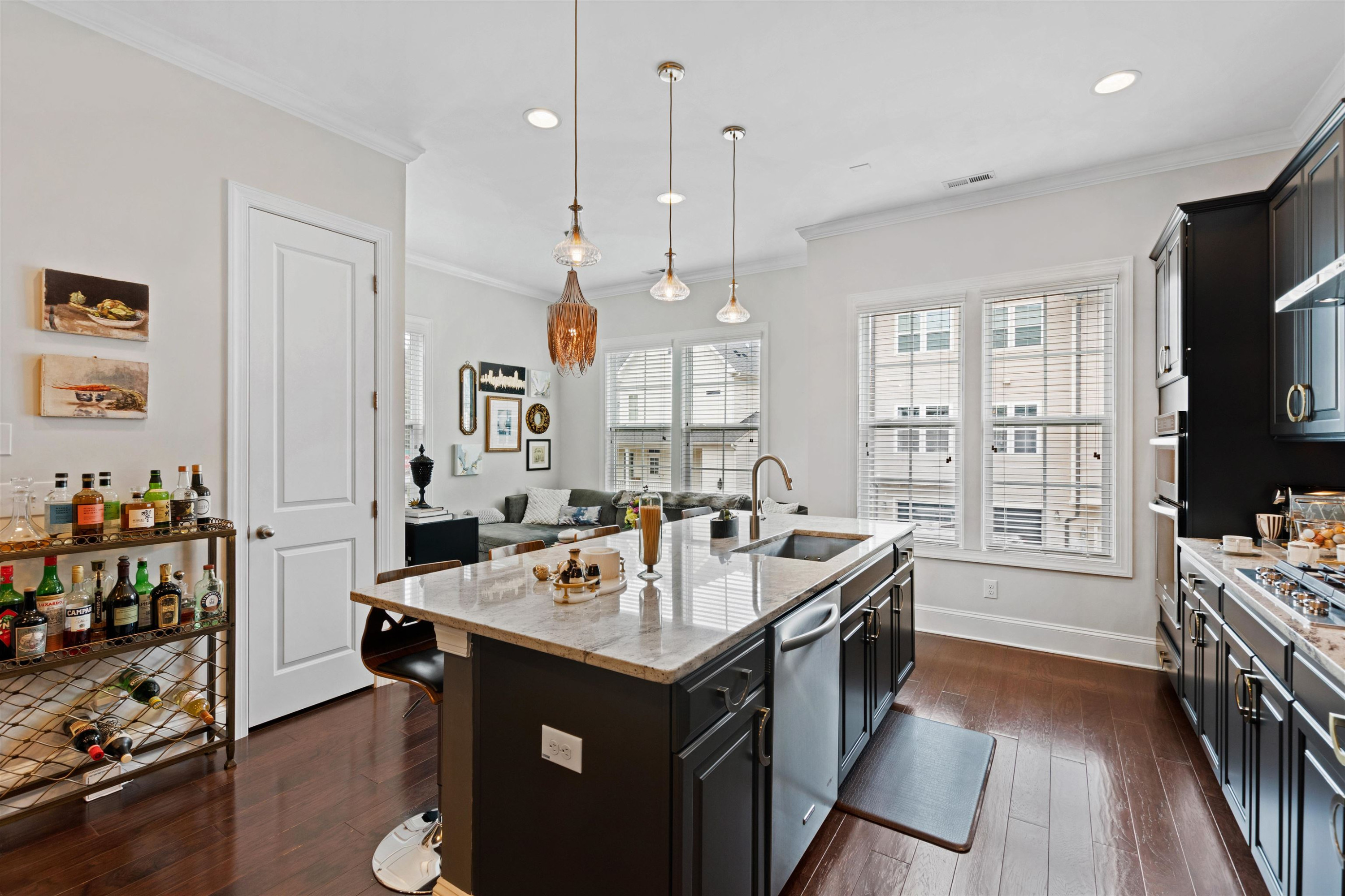 220 Penley Circle Raleigh, NC 27609 - Photo 7 of 56 a kitchen that has a lot of cabinets in it