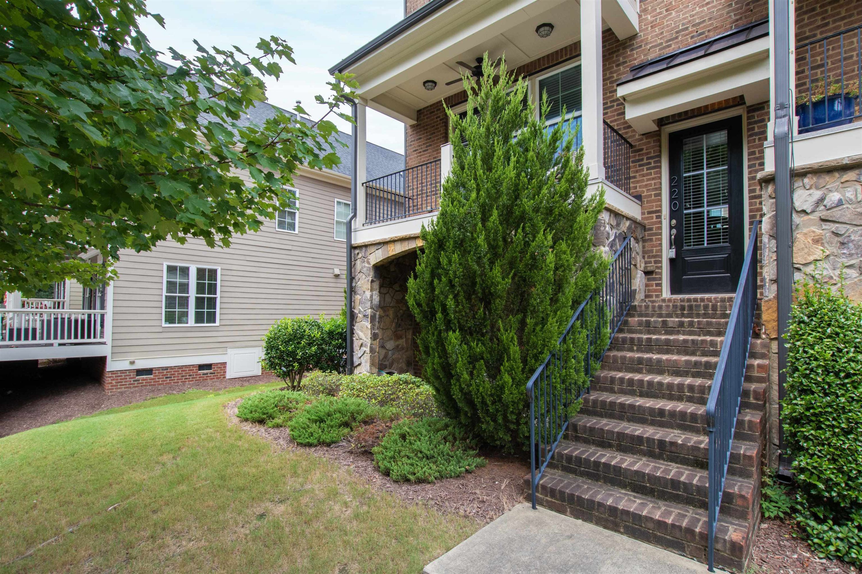 220 Penley Circle Raleigh, NC 27609 - Photo 8 of 56 front view of a house with a yard