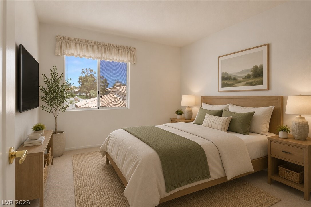 2243 Rugged Mesa Drive Laughlin, NV 89029 - Photo 24 of 32 Natural light illuminates this cozy bedroom, creating a peaceful retreat.