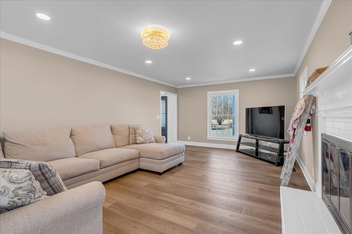 251 Miller Road Hillsboro, TN 37342 - Photo 15 of 80 a living room with furniture and a flat screen tv