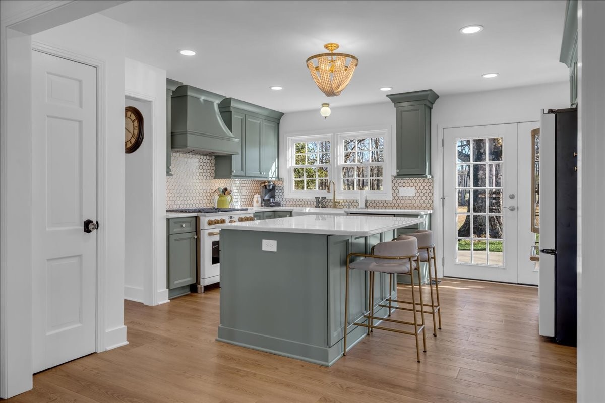 251 Miller Road Hillsboro, TN 37342 - Photo 25 of 80 a kitchen with stainless steel appliances granite countertop a refrigerator and a stove top oven