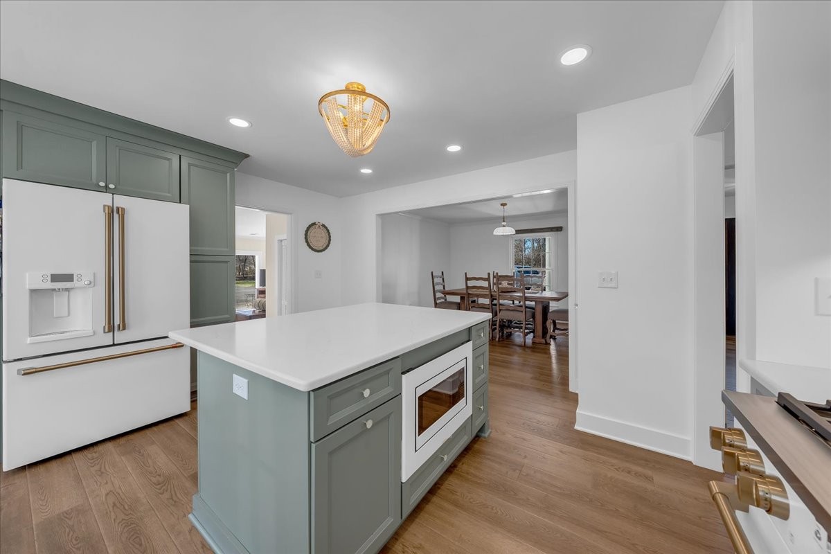 251 Miller Road Hillsboro, TN 37342 - Photo 31 of 80 a kitchen with a refrigerator and a stove