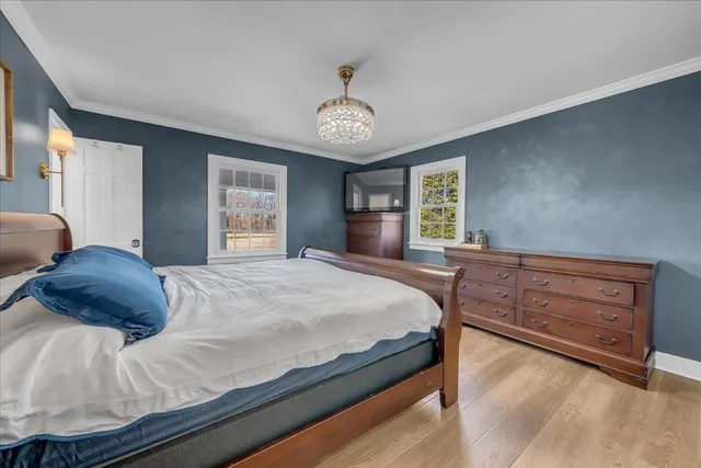 a view of a patio with a table chairs and a patio