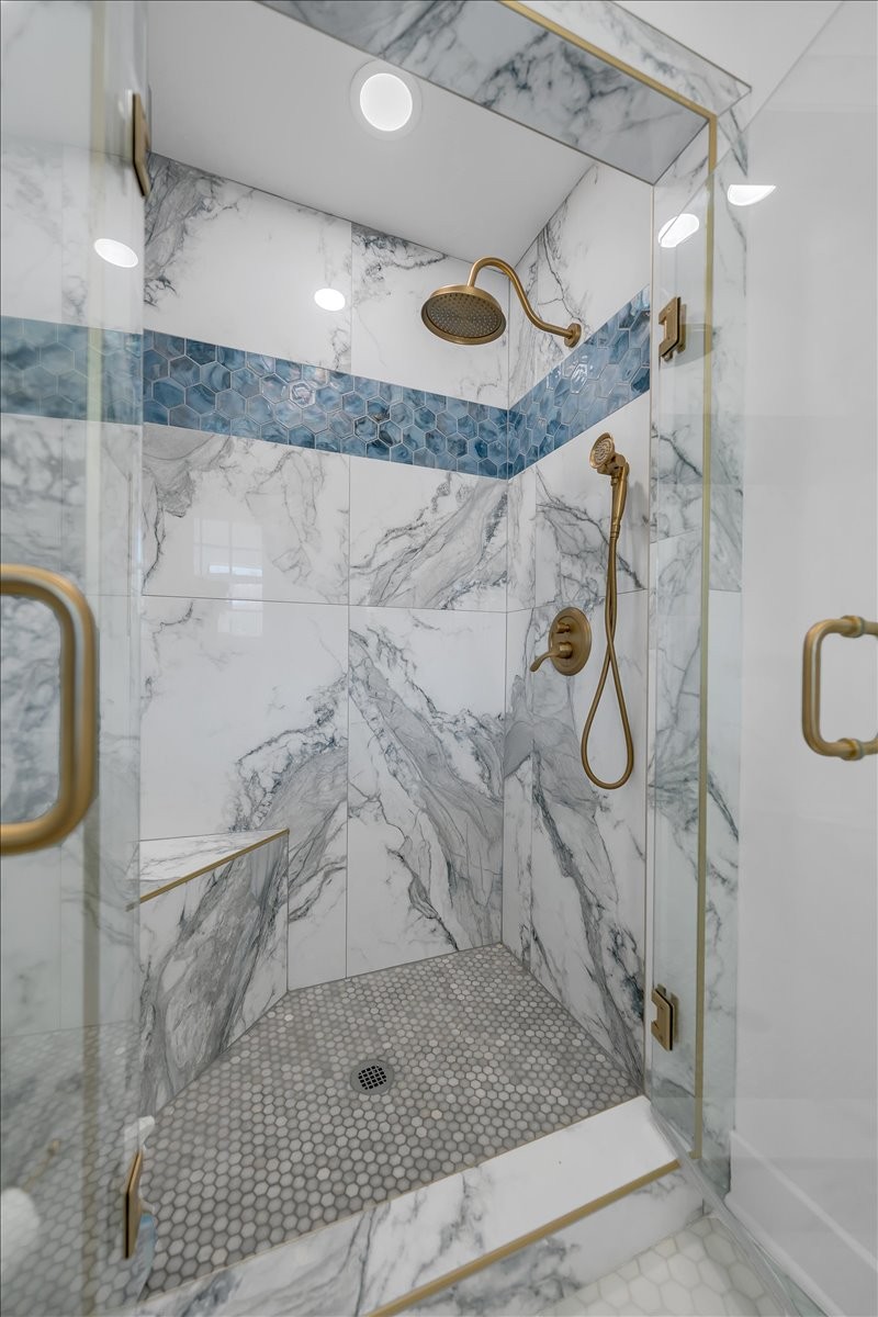 251 Miller Road Hillsboro, TN 37342 - Photo 46 of 80 a bathroom with a granite countertop shower a mirror and vanity