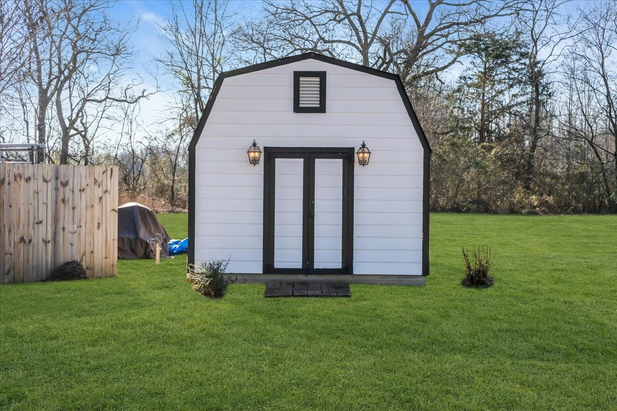 251 Miller Road Hillsboro, TN 37342 - Photo 66 of 80 a front view of a house with garden