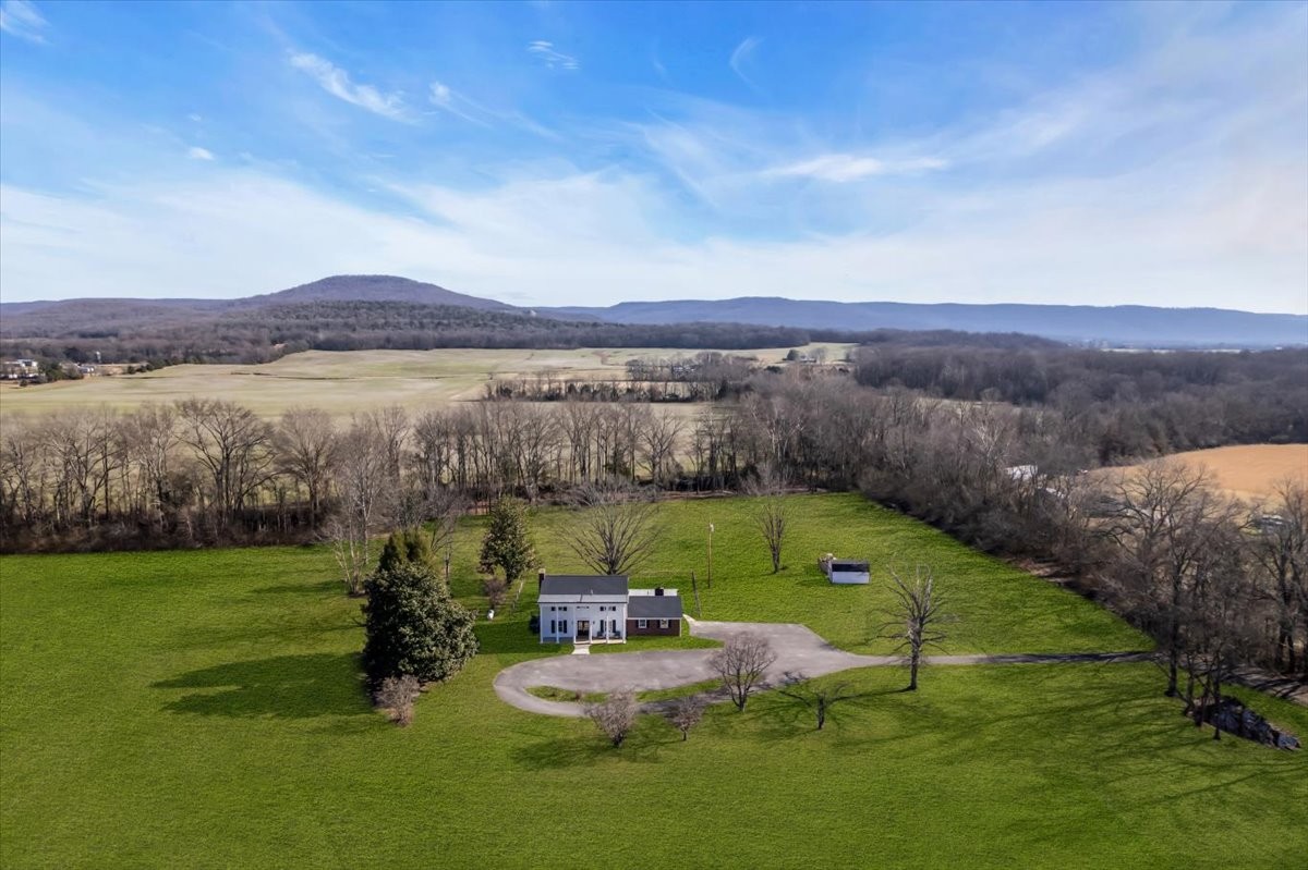 251 Miller Road Hillsboro, TN 37342 - Photo 69 of 80 a view of a lake with couches in front of house