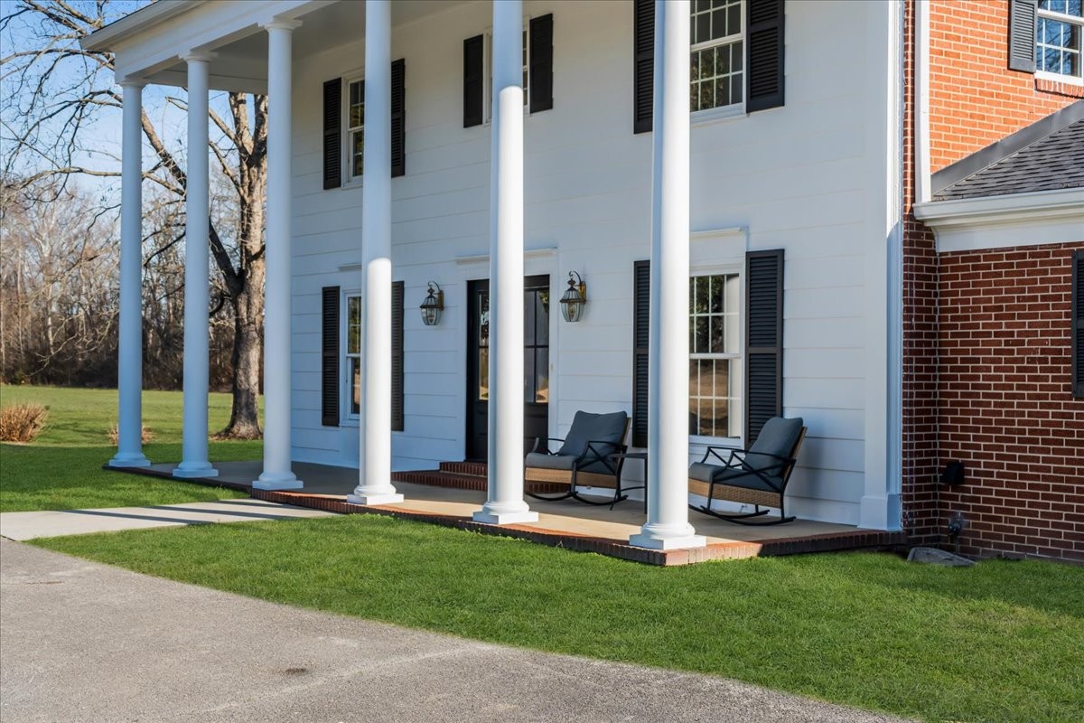 251 Miller Road Hillsboro, TN 37342 - Photo 7 of 80 a view of a house with backyard porch and garden