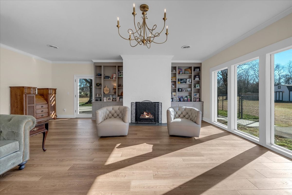 251 Miller Road Hillsboro, TN 37342 - Photo 8 of 80 a living room with furniture and a fireplace