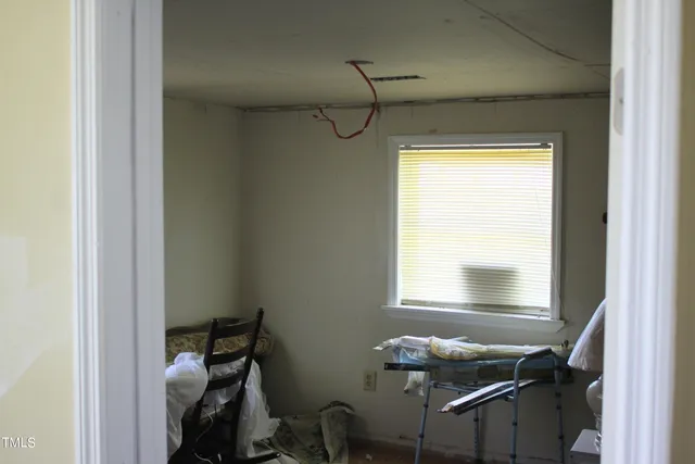 a room with storage and windows