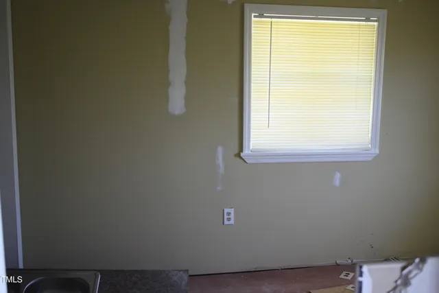 a view of a small space with a window