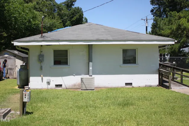 a front view of house with yard