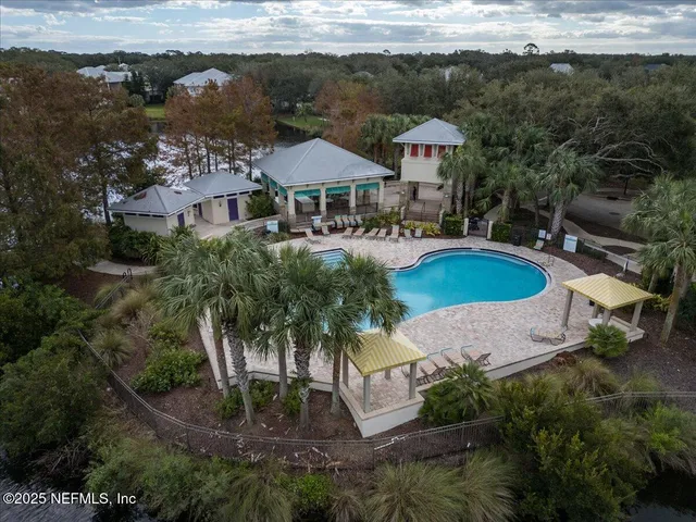 a view of entryway with bathroom and shower
