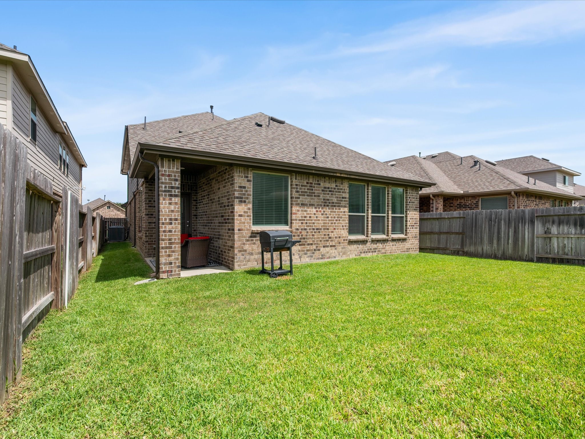 7123 Poppyseed Trail Spring, TX 77379 - Photo 26 of 30 A spacious fenced backyard offers plenty of room to play, garden, entertain, or simply enjoy the outdoors.