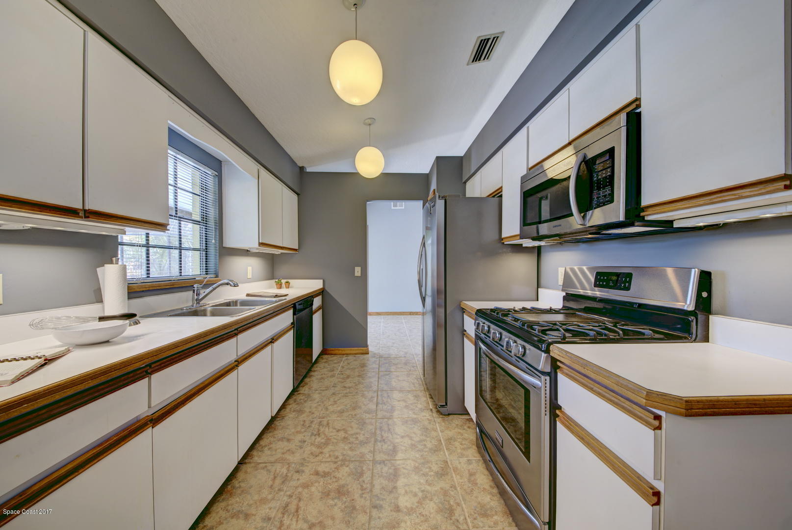 133 Oak Lake Road Melbourne, FL 32901 - Photo 12 of 45 Kitchen with Stainless Steel Appliances