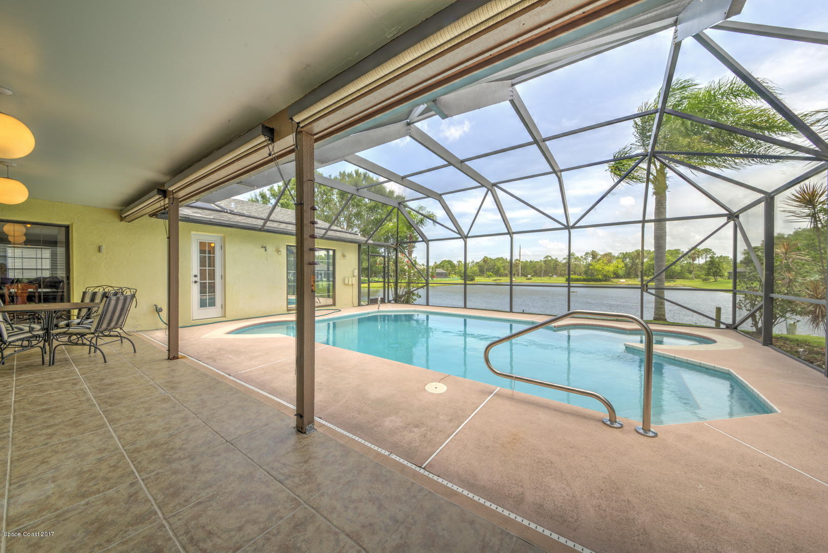 133 Oak Lake Road Melbourne, FL 32901 - Photo 36 of 45 Lanai & Pool access to Bathroom 2