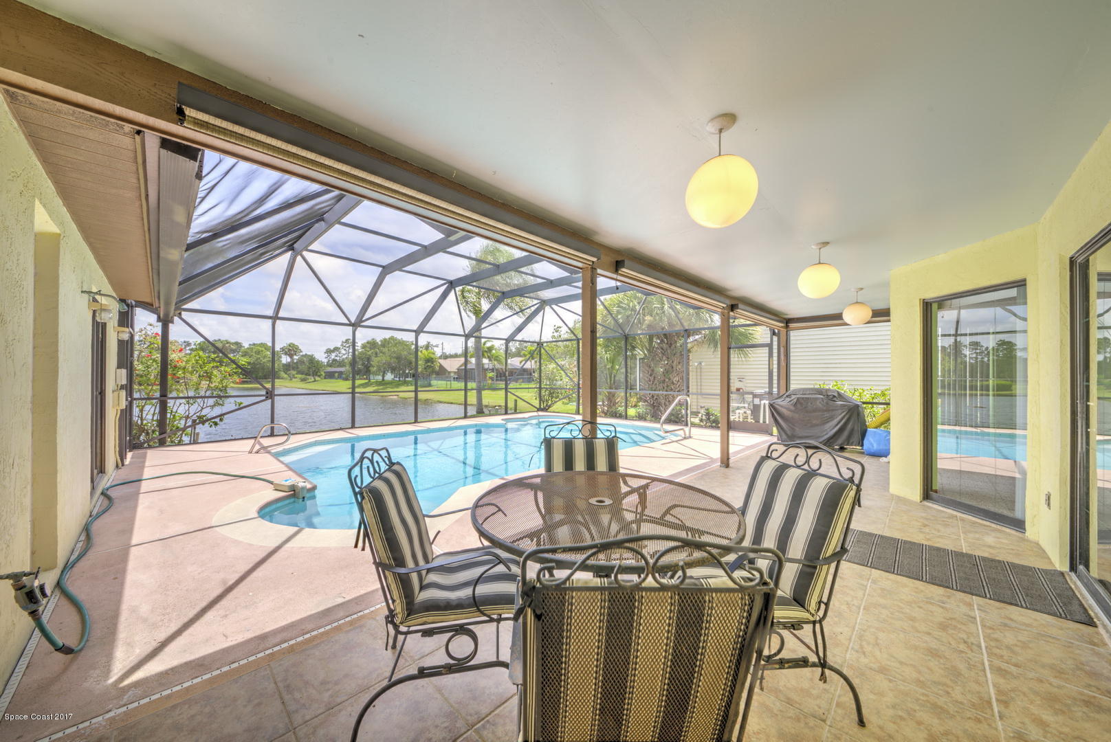 133 Oak Lake Road Melbourne, FL 32901 - Photo 39 of 45 Screen Enclosed Lanai & Pool