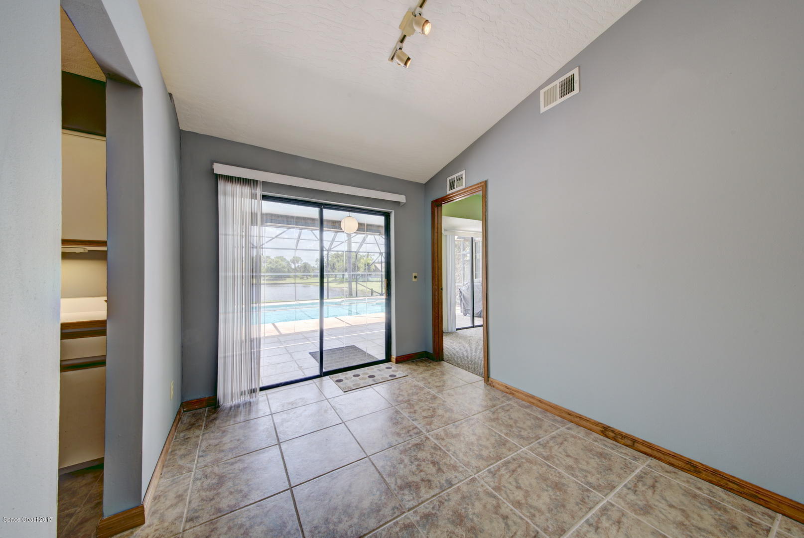 133 Oak Lake Road Melbourne, FL 32901 - Photo 8 of 45 Dining Area access to Patio