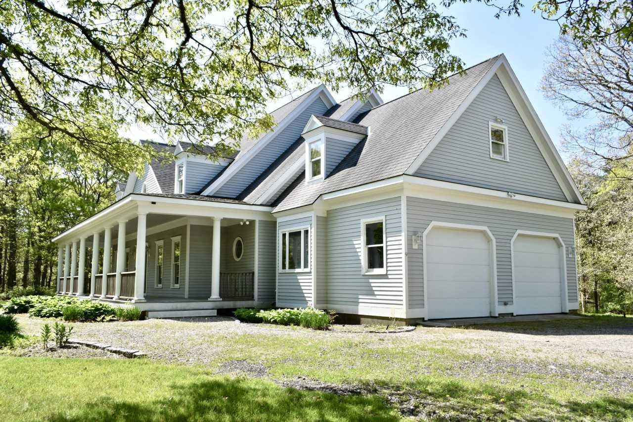 9 Hi River Road Marstons Mills, MA 02648 - Photo 4 of 34 a front view of a house with a yard