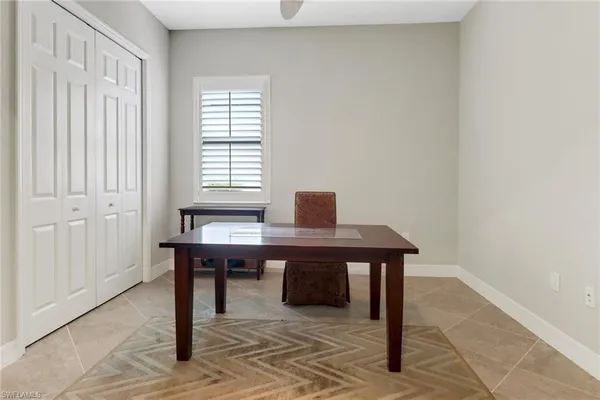 a view of a workspace with furniture