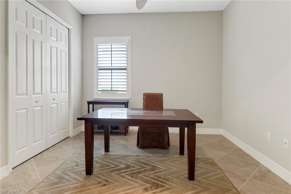 1878 Mustique Street Naples, FL 34120 - Photo 18 of 50 a view of a workspace with furniture