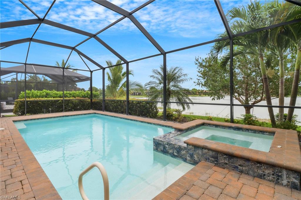 1878 Mustique Street Naples, FL 34120 - Photo 32 of 50 a view of a backyard