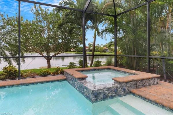 a view of a backyard with sitting area