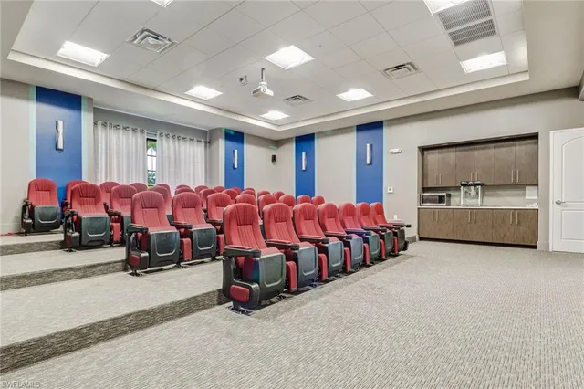 a large bedroom with furniture