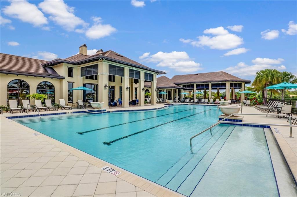 1878 Mustique Street Naples, FL 34120 - Photo 50 of 50 a view of a swimming pool with a patio