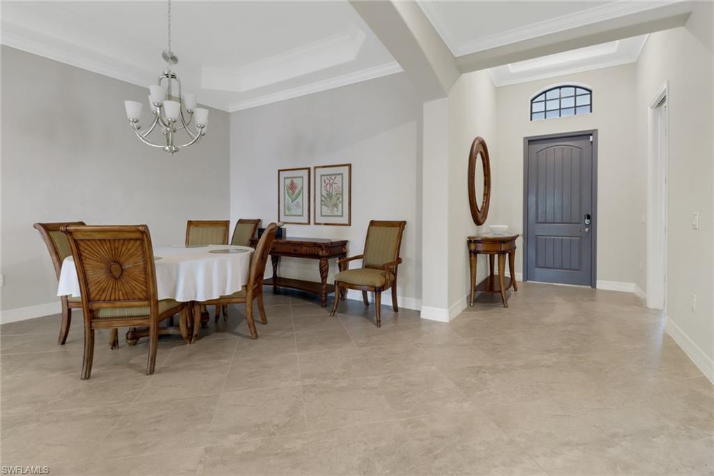 1878 Mustique Street Naples, FL 34120 - Photo 5 of 50 a view of a livingroom with furniture and chandelier