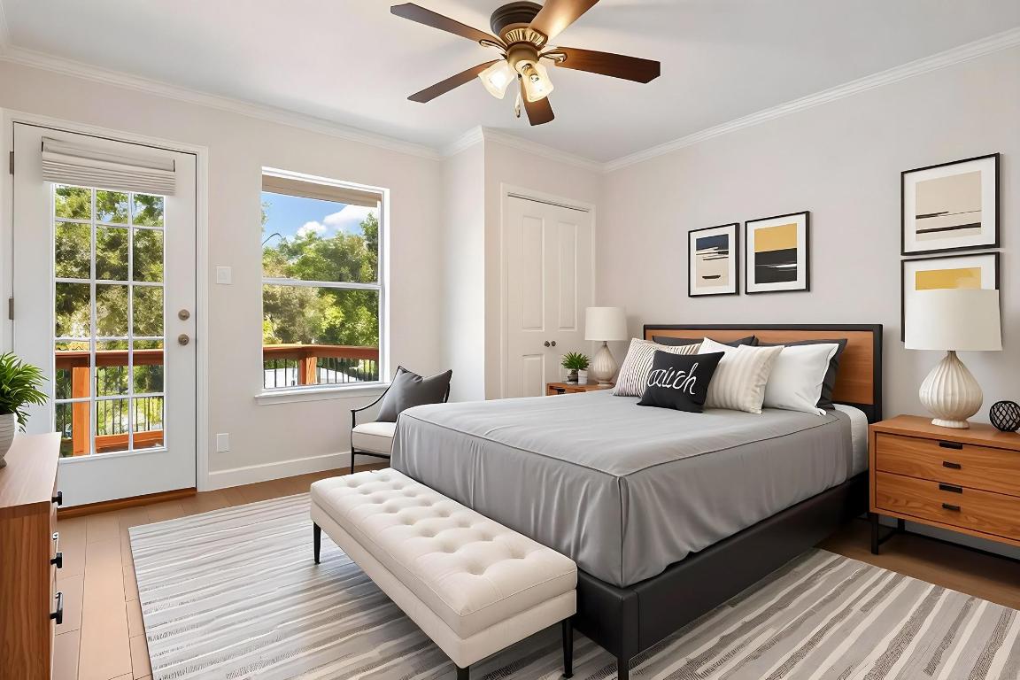 3913 Caney Creek Road Austin, TX 78732 - Photo 16 of 30 a bedroom with a bed and wooden floor