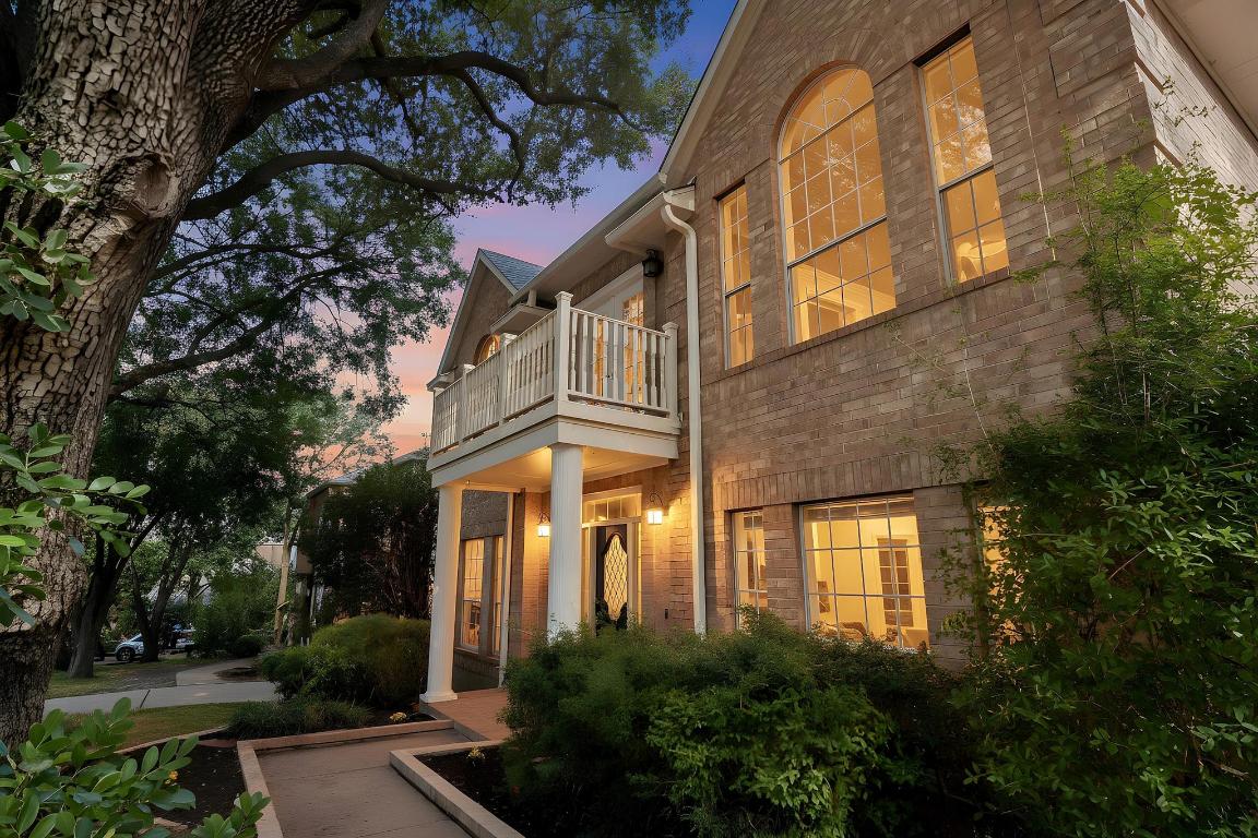 3913 Caney Creek Road Austin, TX 78732 - Photo 2 of 30 front view of a house with a yard