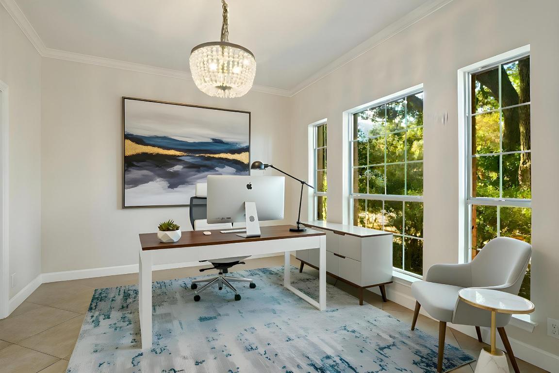 3913 Caney Creek Road Austin, TX 78732 - Photo 5 of 30 a view of a room with a table and chairs