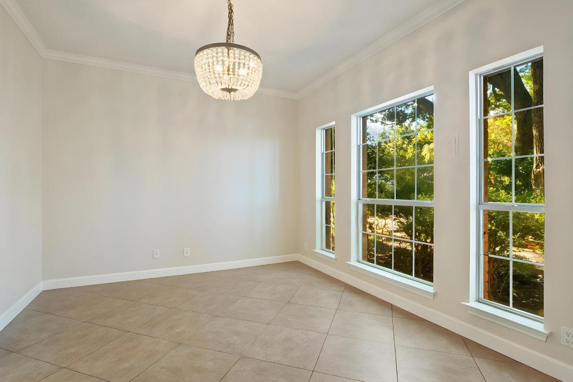 3913 Caney Creek Road Austin, TX 78732 - Photo 6 of 30 a view of an empty room with a window