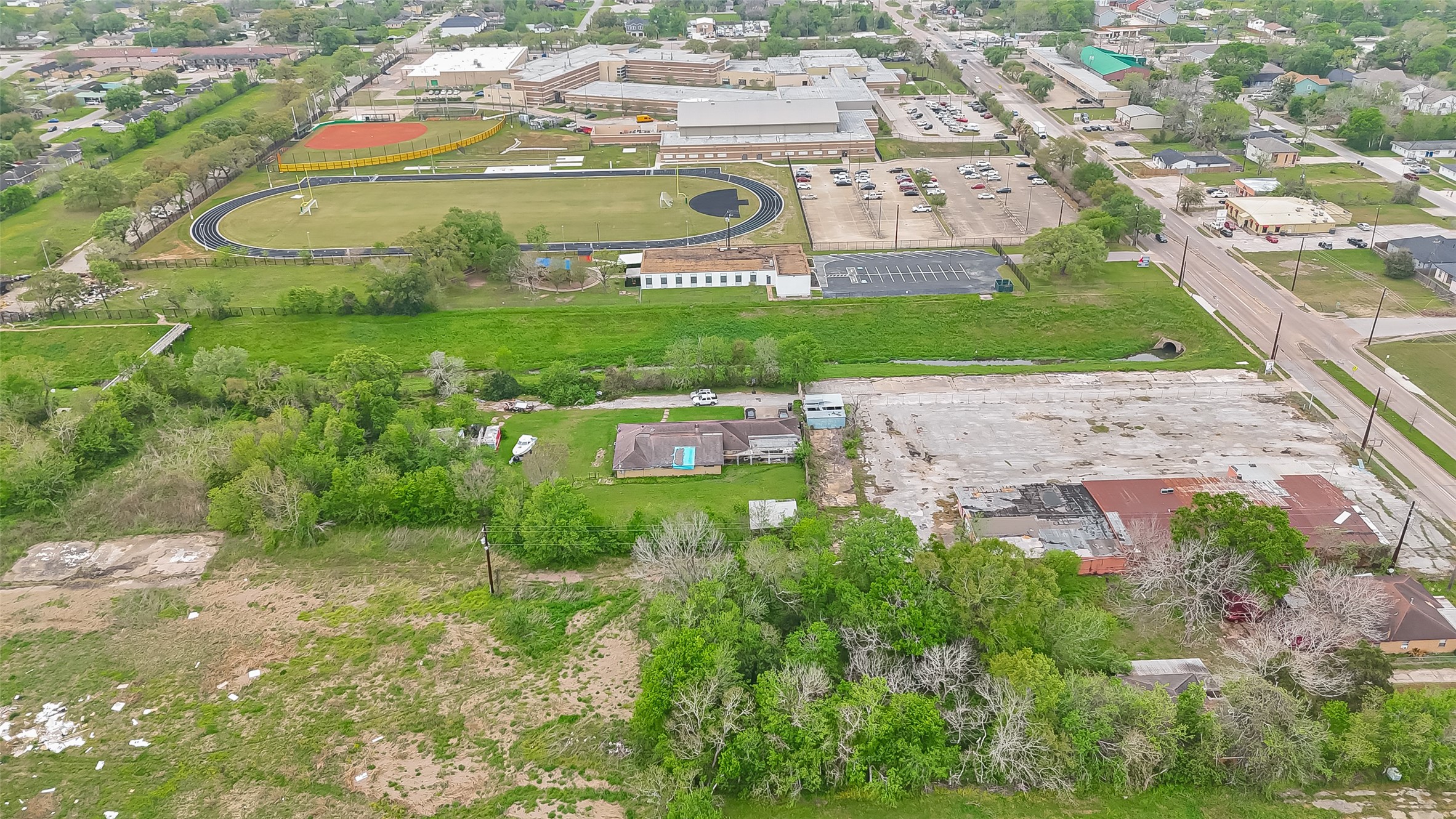 4314 Reed Road Houston, TX 77051 - Photo 11 of 21 an aerial view of residential houses with outdoor space and trees