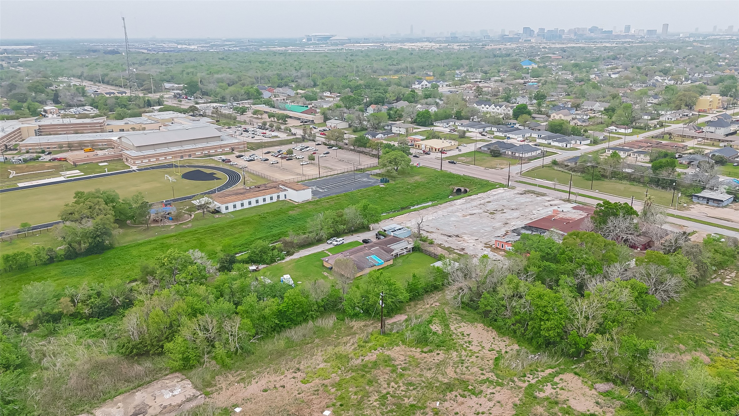 4314 Reed Road Houston, TX 77051 - Photo 16 of 21 an aerial view of residential houses with outdoor space and trees