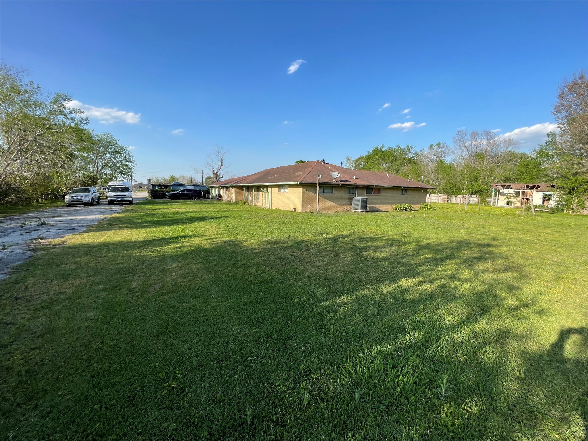 4314 Reed Road Houston, TX 77051 - Photo 19 of 21 a view of a house with a big yard