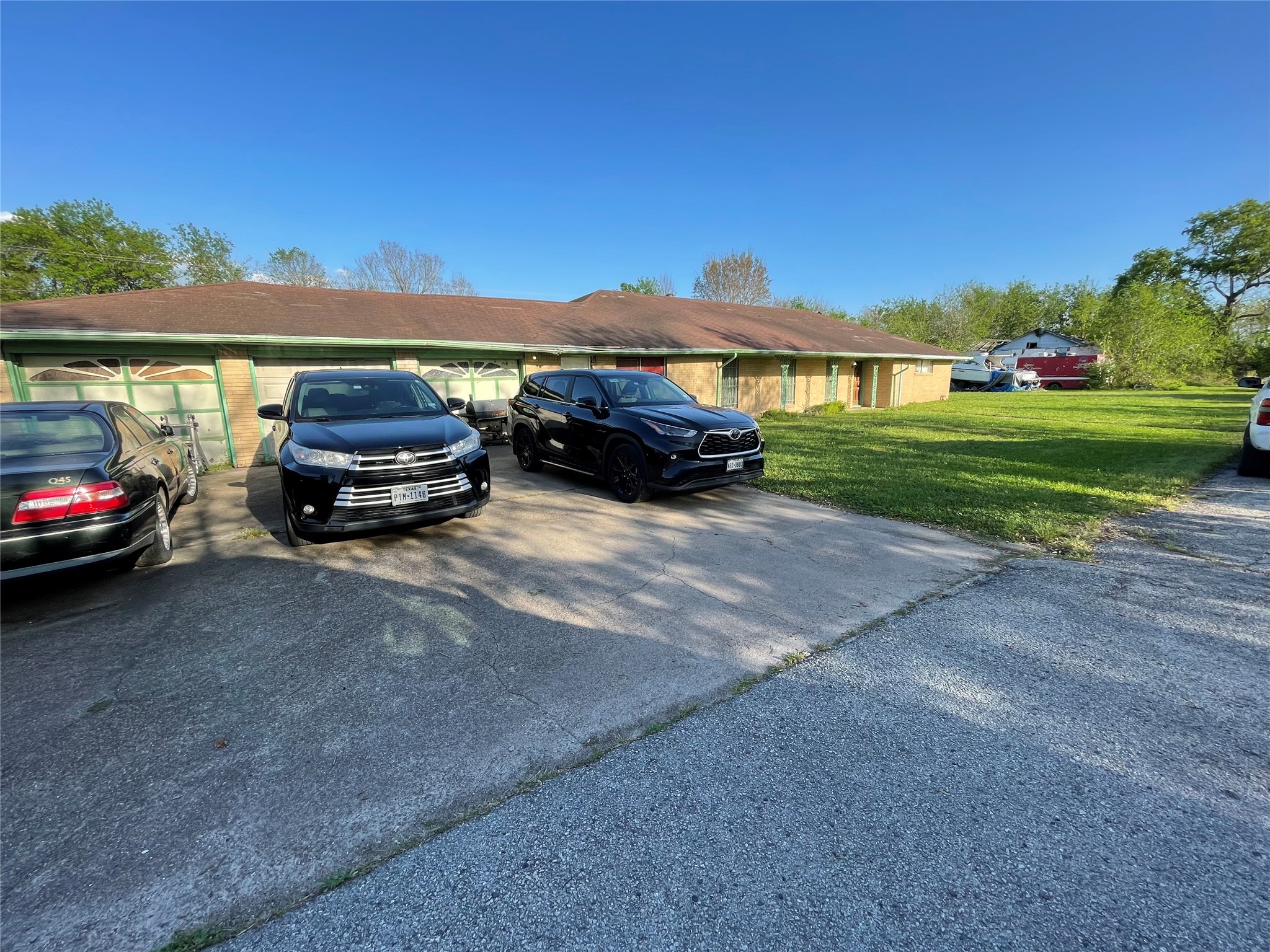 4314 Reed Road Houston, TX 77051 - Photo 3 of 21 This image showcases the external appearance of the property, providing a clear depiction of the home's facade,3 car garage, landscaping, and surrounding environment.