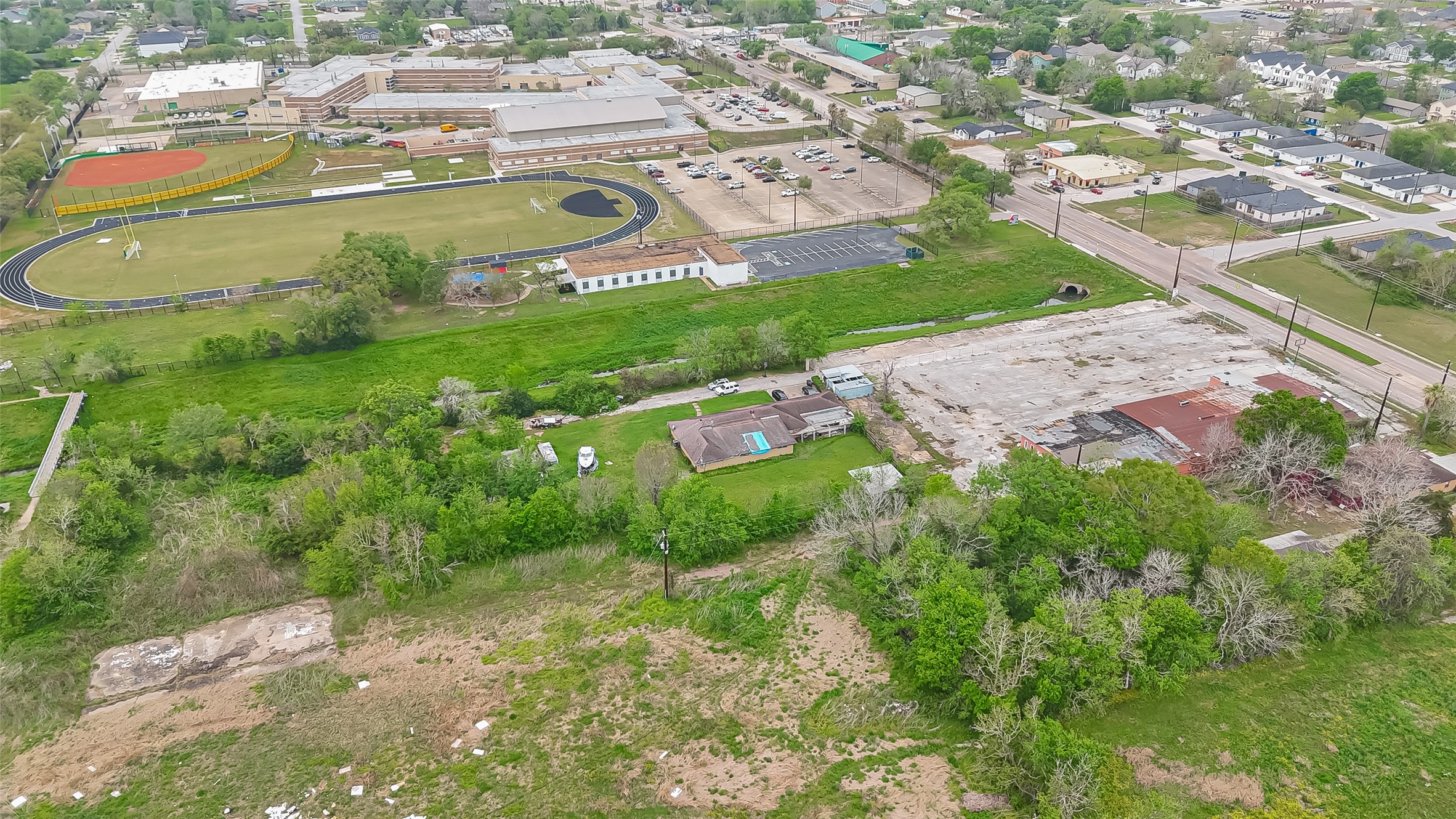 4314 Reed Road Houston, TX 77051 - Photo 6 of 21 an aerial view of residential houses with outdoor space and trees