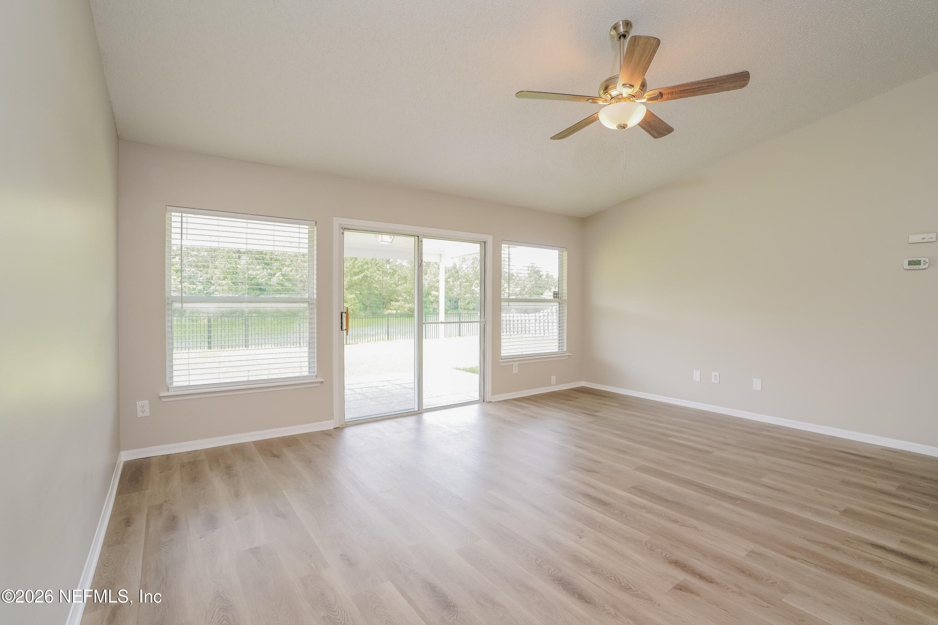 3159 Wavering Lane Middleburg, FL 32068 - Photo 3 of 17 002-photo-living-room-11235563