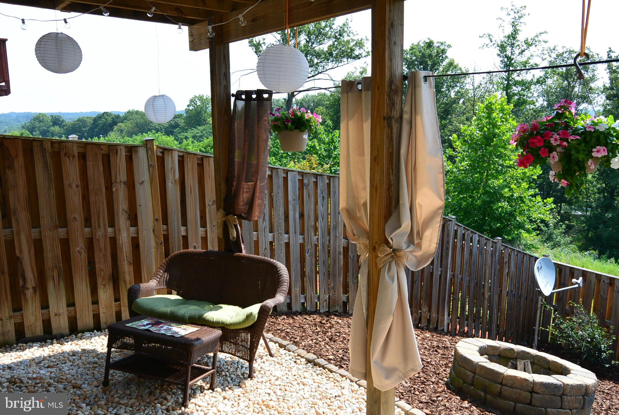 70 Short Branch Road Stafford, VA 22556 - Photo 27 of 30 Rear Patio with Privacy Curtains