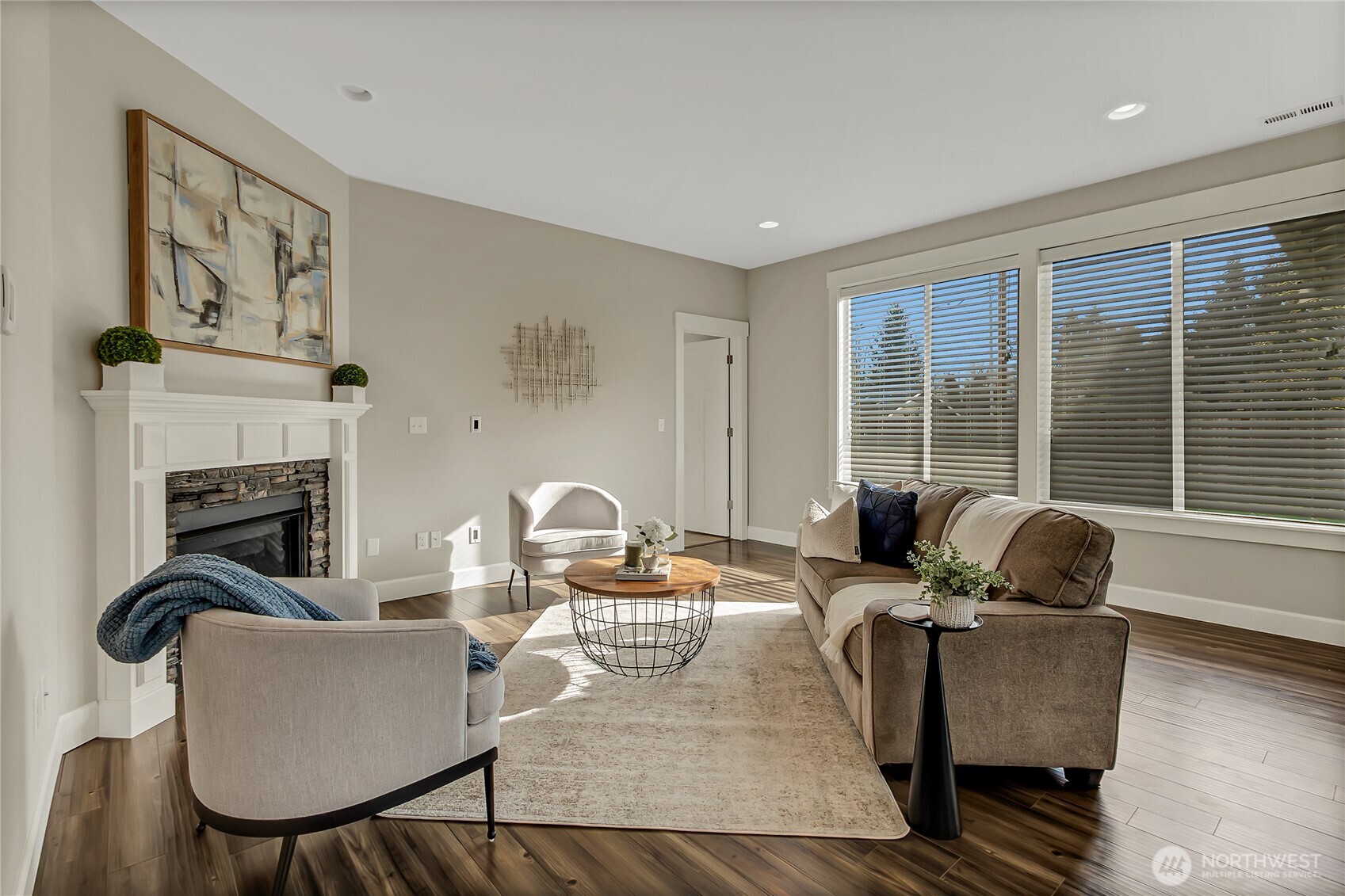 14925 Benton Loop Sumner, WA 98390 - Photo 15 of 40 a living room with furniture and a fireplace