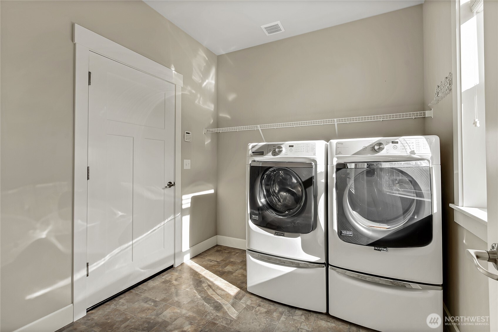 14925 Benton Loop Sumner, WA 98390 - Photo 20 of 40 a utility room with dryer and washer