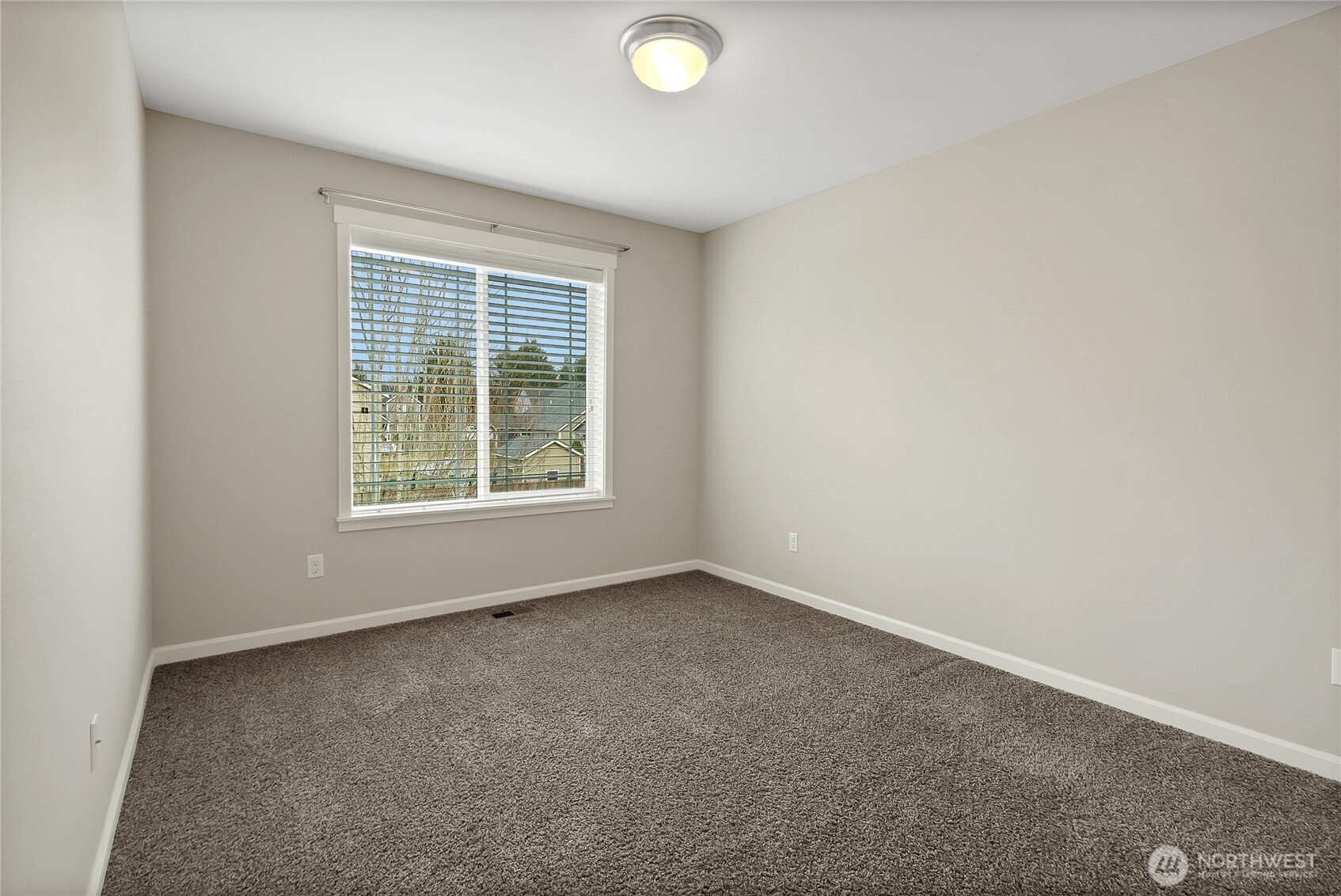 14925 Benton Loop Sumner, WA 98390 - Photo 22 of 40 an empty room with a window