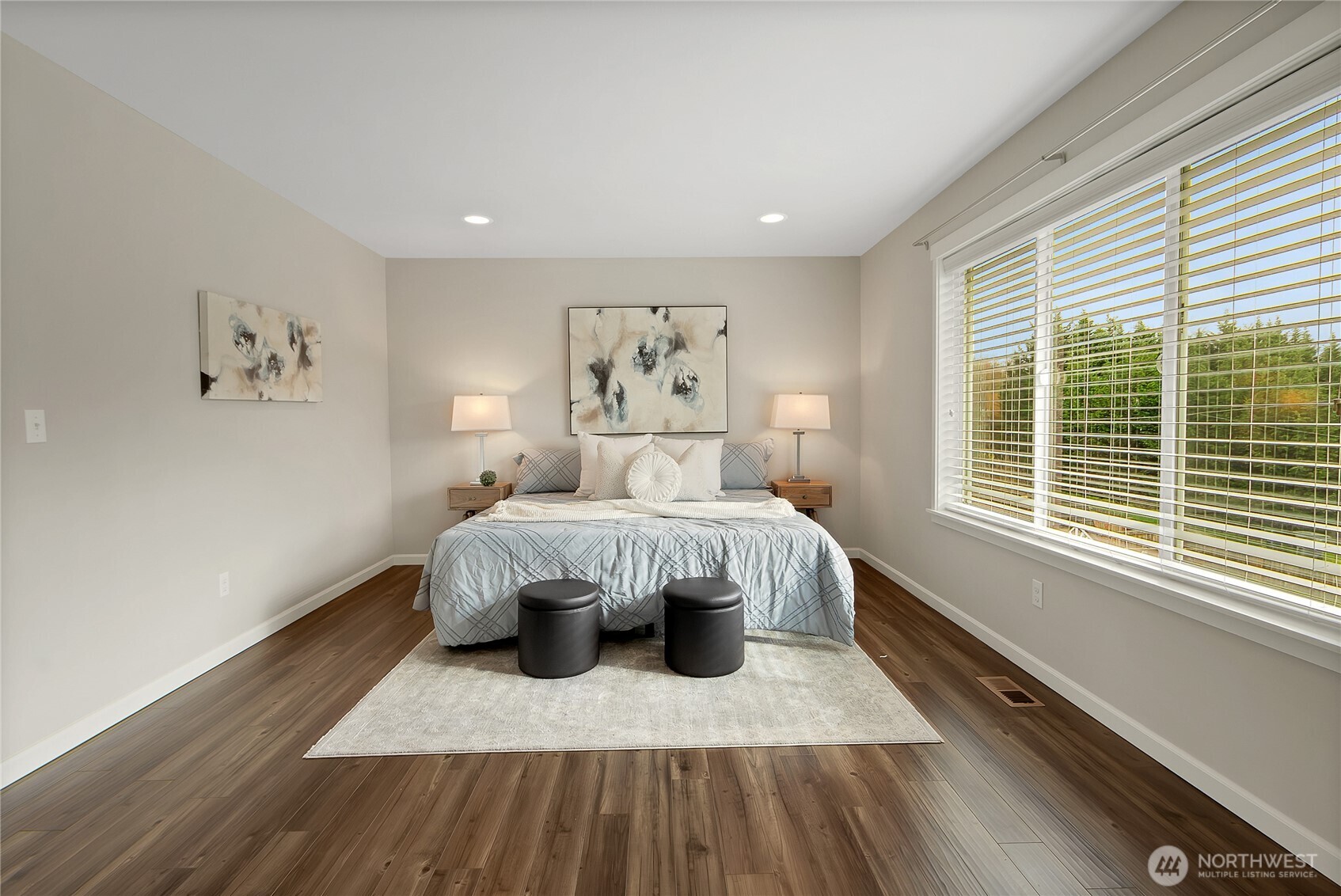 14925 Benton Loop Sumner, WA 98390 - Photo 26 of 40 a bedroom with a bed and a large window