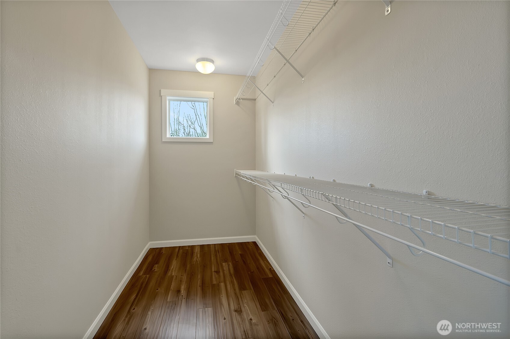 14925 Benton Loop Sumner, WA 98390 - Photo 30 of 40 a view of small space with racks on the wall