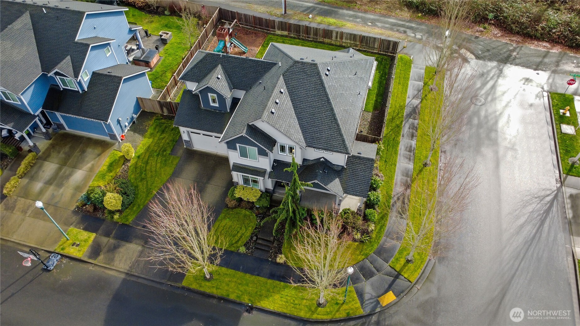 14925 Benton Loop Sumner, WA 98390 - Photo 38 of 40 a view of a house with a swimming pool