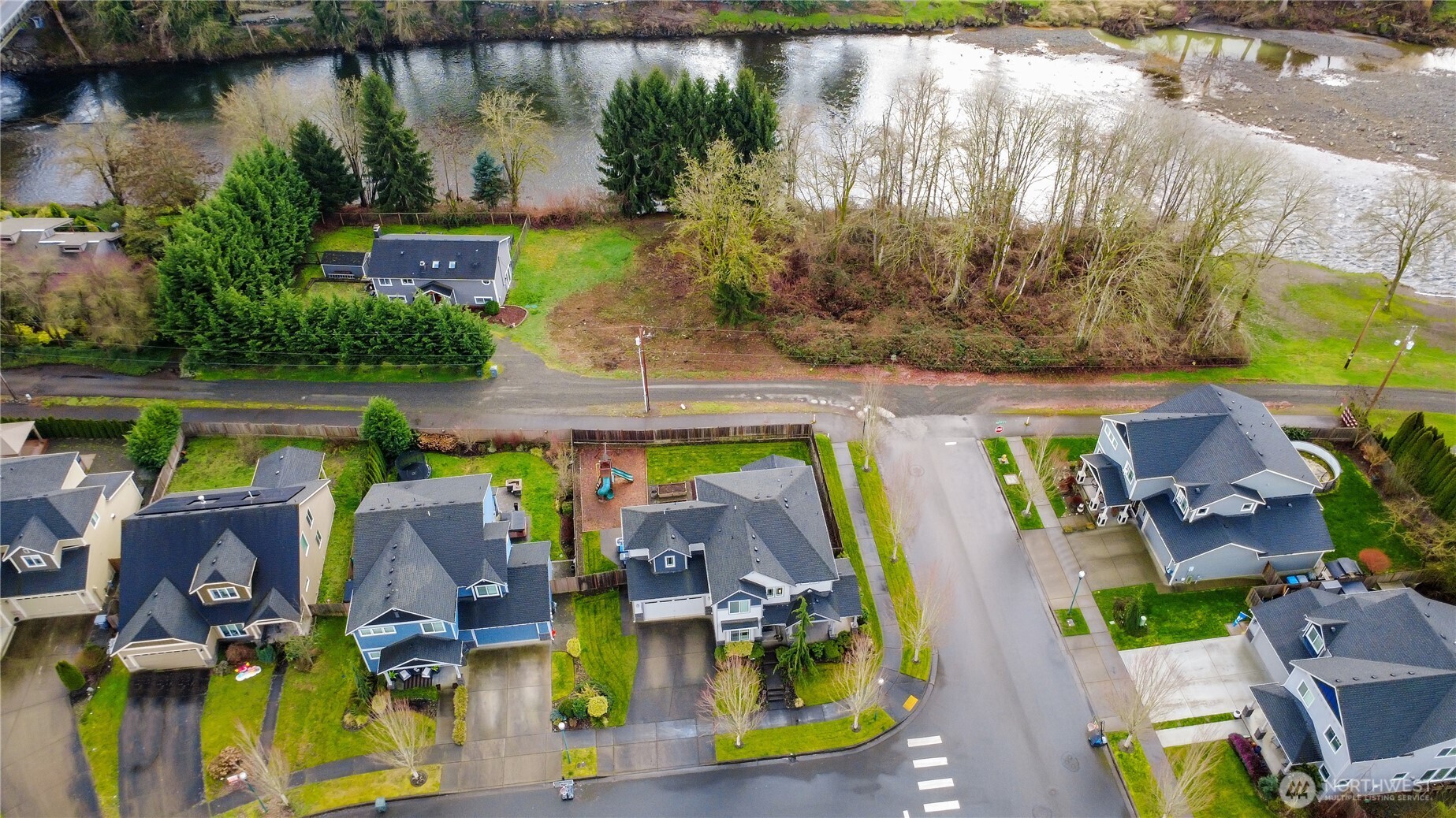 14925 Benton Loop Sumner, WA 98390 - Photo 40 of 40 an aerial view of house with yard swimming pool and outdoor seating